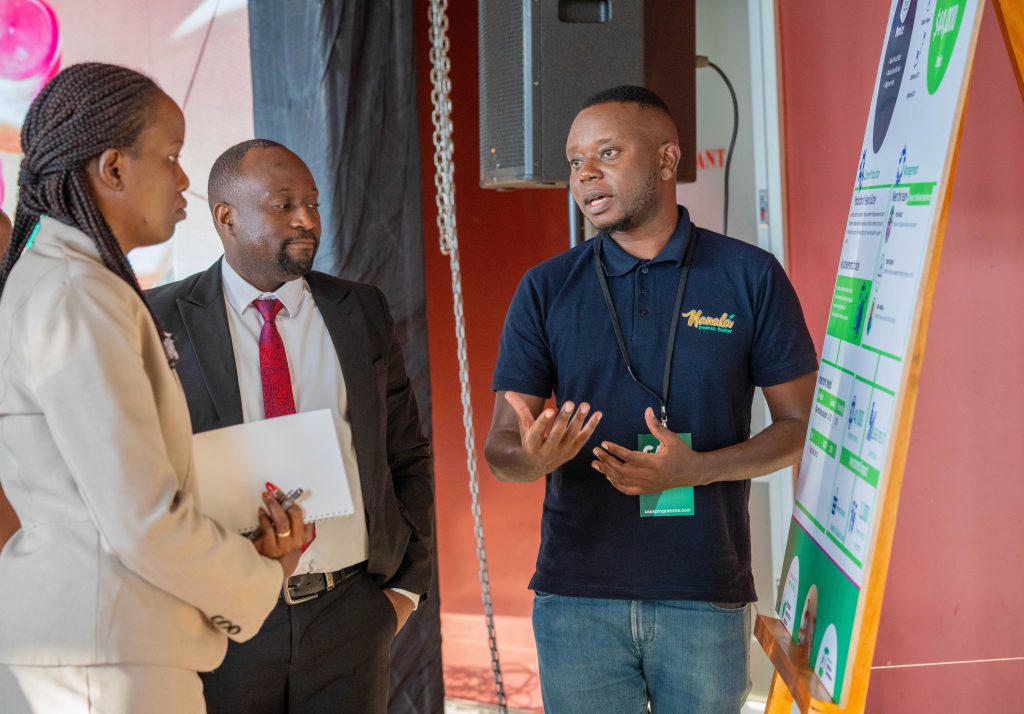 Modie Chanza from MITC hearing the investment pitch from Joseph Gondwe of Theophilus Investments.nza from MITC hearing the investment pitch